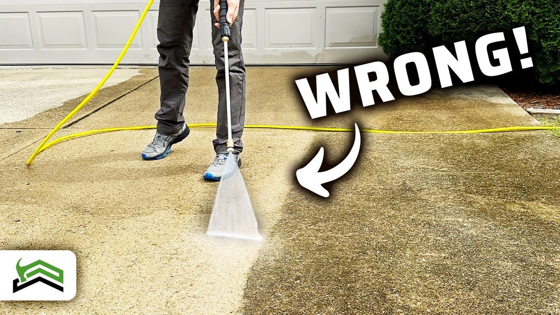 Power washing equipment cleaning concrete driveway